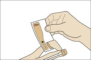 Diagram showing peeling remaining tape of sensor on finger